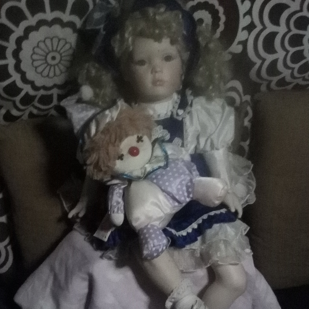 Annabelle type porcelain doll w/clown music box